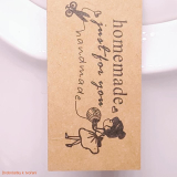 Papírová etiketa homemade visačka holčička s klubkem 27x57mm