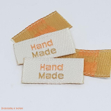 Handmade textilní etiketa 23x10mm hnědooranžová